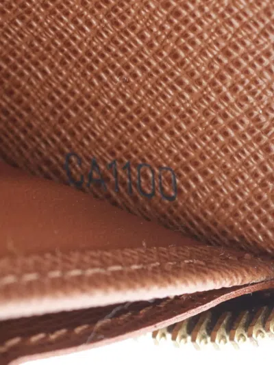 Pre-owned Louis Vuitton 2010 Zippy Wallet In Brown