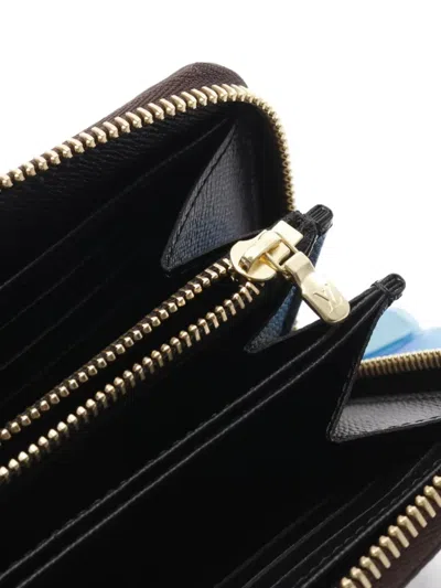 Pre-owned Louis Vuitton 2021 Zippy Monogram Zipper Wallet In Brown