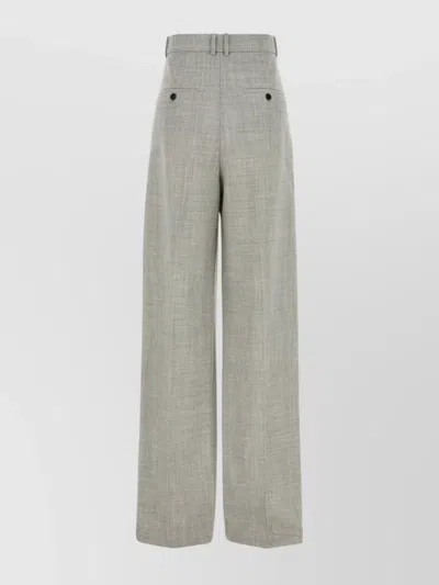Saint Laurent Wool Trousers With Wide Leg And Pleated Front