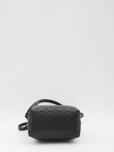 Gucci Gg Emblem Small Leather Bucket Bag In Black