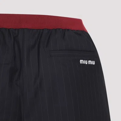 Miu Miu Virgin Wool Pinstriped Shorts In Black