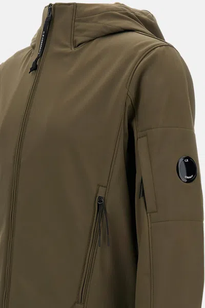 C.p. Company Matte-finish Hooded Jacket With Zippered Pockets And Logo Patch