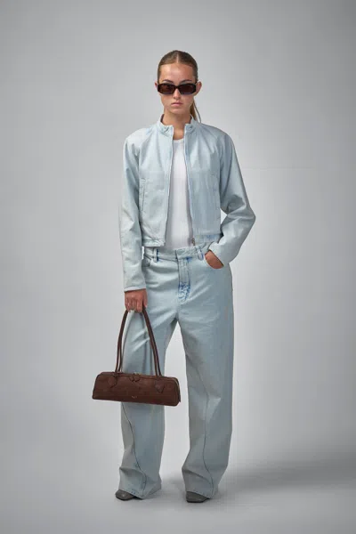 Alaïa Twisted Straight-leg Jeans In Blue