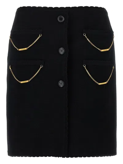 Moschino Skirt With Chain Embellishments And Scalloped Edges In Black