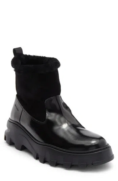 Stuart Weitzman Alton Genuine Shearling Lined Lug Sole Boot In Black