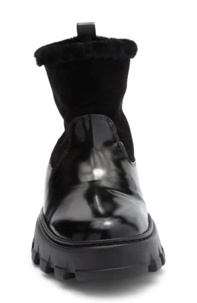 Stuart Weitzman Alton Genuine Shearling Lined Lug Sole Boot In Black