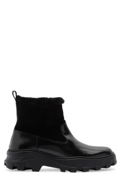 Stuart Weitzman Alton Genuine Shearling Lined Lug Sole Boot In Black