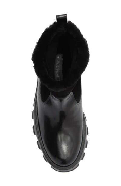 Stuart Weitzman Alton Genuine Shearling Lined Lug Sole Boot In Black