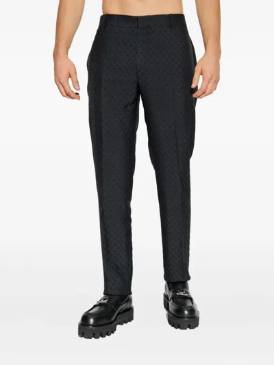 Alexander Mcqueen Skull Motif Tailored Trousers In Black