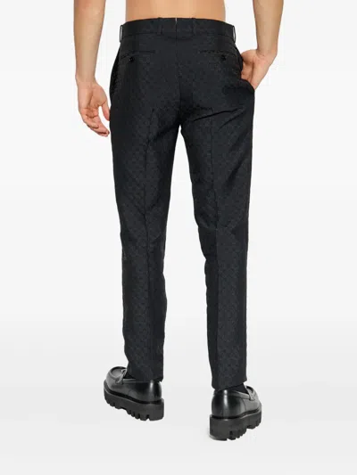 Alexander Mcqueen Skull Motif Tailored Trousers In Black
