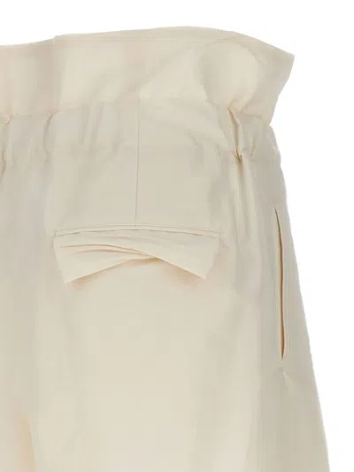 Issey Miyake White Enfold Trousers In Orange