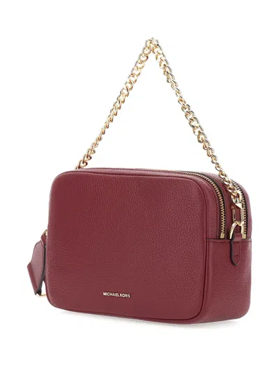 Michael Michael Kors Bryant Bordeaux Crossbody Bag With Adjustable Shoulder Strap And Logo Lettering On The Front In Grai
