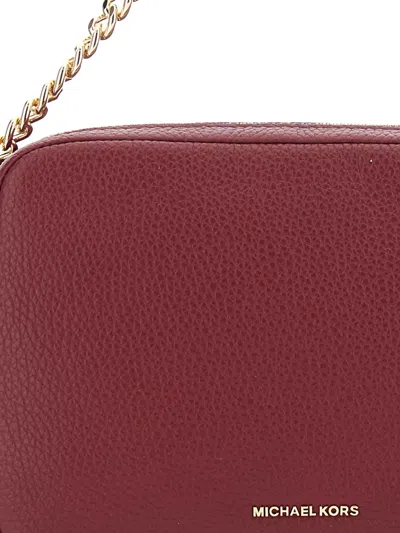 Michael Michael Kors Bryant Bordeaux Crossbody Bag With Adjustable Shoulder Strap And Logo Lettering On The Front In Grai
