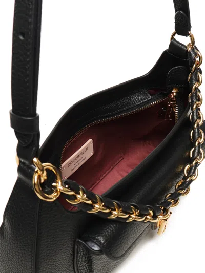 Coccinelle Beat Chain-trimmed Shoulder Bag In Black