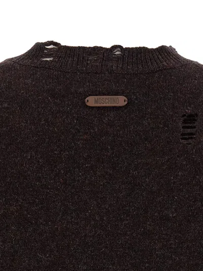 Moschino Distressed Ribbed Sweater With Cuffs And Hem In Black