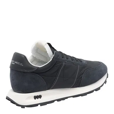 Philippe Model Low Top Sneakers With Rubber Sole And Suede Accents In Black