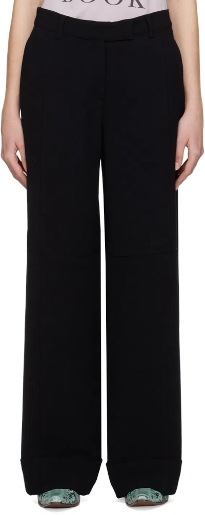 Acne Studios Turn-up Wide-leg Trousers In Black