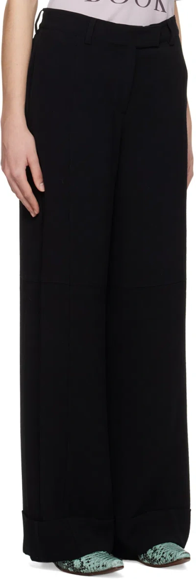 Acne Studios Turn-up Wide-leg Trousers In Black