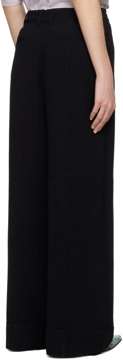 Acne Studios Turn-up Wide-leg Trousers In Black