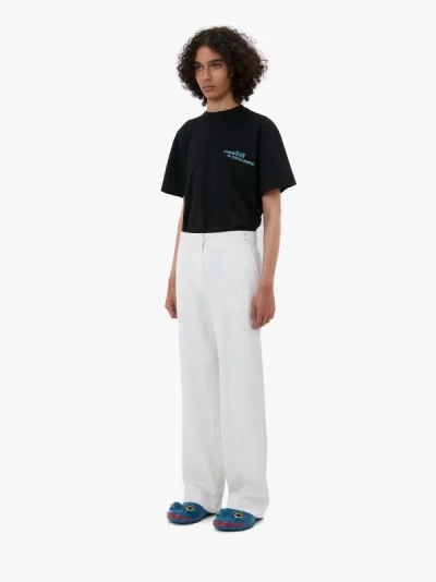 Jw Anderson Rivet-detailing Straight-leg Trousers In White