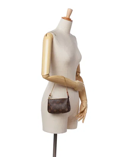 Pre-owned Louis Vuitton 2019 Monogram Mini Pochette Accessoires Handbag In Brown