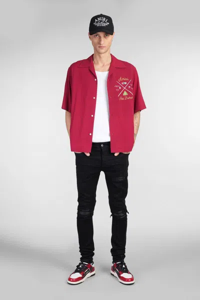 Amiri Distressed Slim Fit Jeans In Black