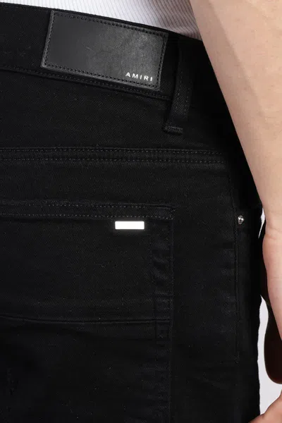 Amiri Distressed Slim Fit Jeans In Black