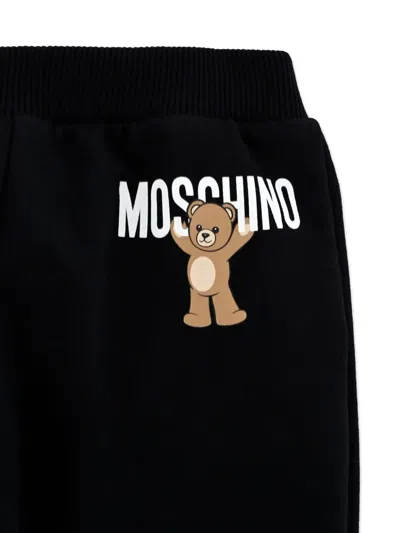 Moschino Teddy-print Cotton Trousers In Black