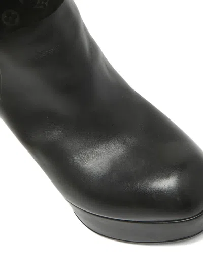 Pre-owned Louis Vuitton Monogram Platform Boots In Black