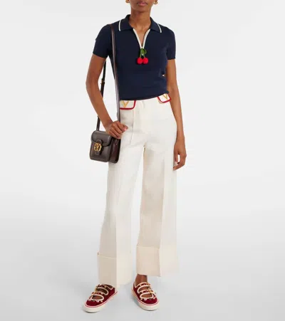 Valentino Embellished Double-buckled Sneakers In Red