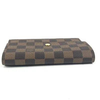 Pre-owned Louis Vuitton Brown Ebene Damier Canvas Long Wallet (tri-fold) ()