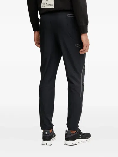Under Armour Panelled Zip-pocket Trousers In Black