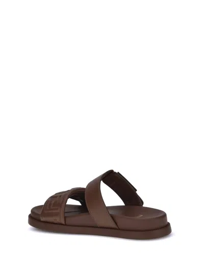 Fendi Slide Sandals With Buckle Detail And Flat Sole