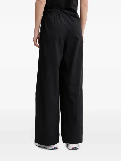 Under Armour Pleated Wide-leg Trousers In Black