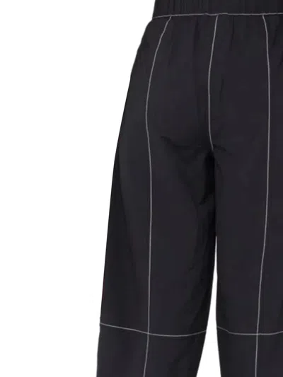Ganni Womens Black Curved-leg Mid-rise Organic Cotton-blend Trousers In Black