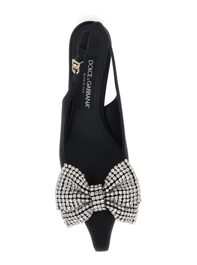 Dolce & Gabbana Black Slingback Pumps With Rhinestone Bow Detail In Silk Blend Woman