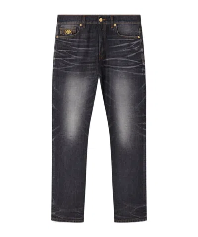 Versace Denim Jeans With Faded Effect And Contrast Stitching In Black