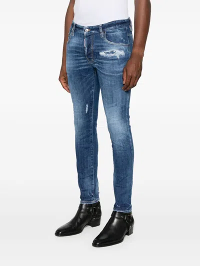 Dsquared2 Blue Jeans With Ripped Details And Logo Patch On The Rear In Denim Man