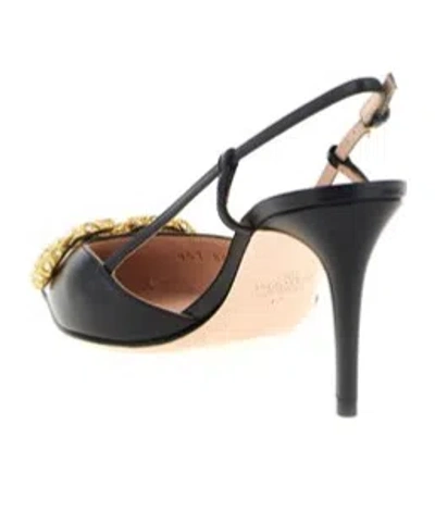 Valentino Vlogo Signature Slingback Pointed Toe Pumps In Black