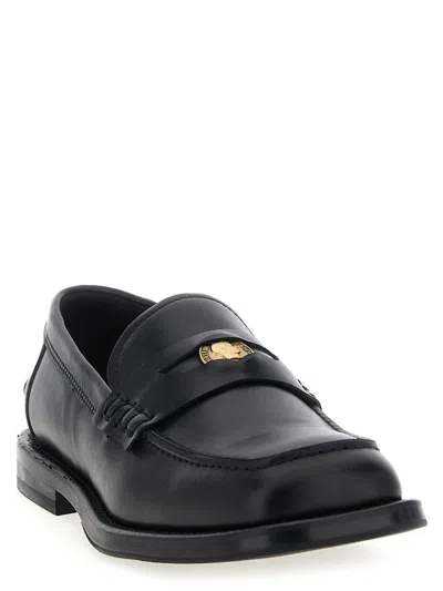 Moschino Strap Penny Round Toe Loafers In Black
