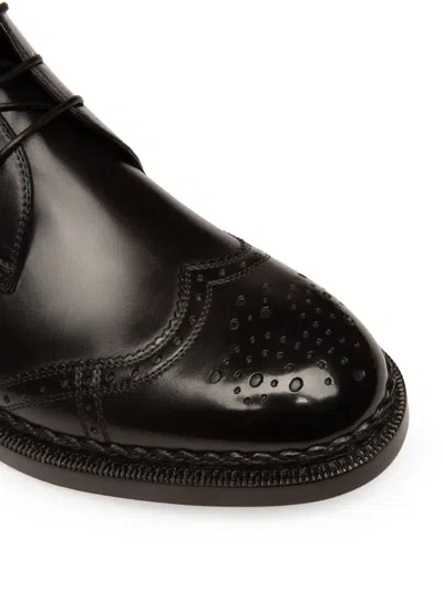 Bally Oktavio Leather Brogue Boots In Black