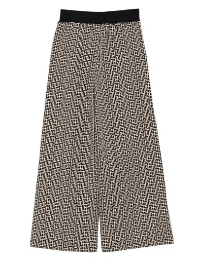 Balmain Monogram-pattern Trousers In Black