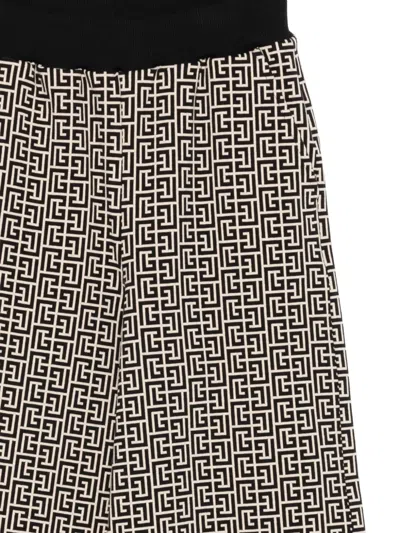 Balmain Monogram-pattern Trousers In Black