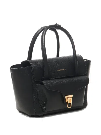 Coccinelle Double Beat Shoulder Bag In Black