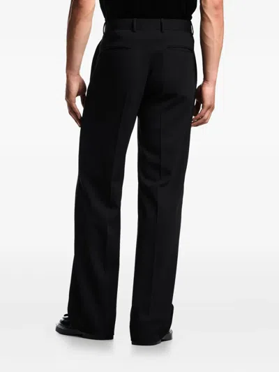 Emporio Armani Pleated Side-stripe Trousers In Black
