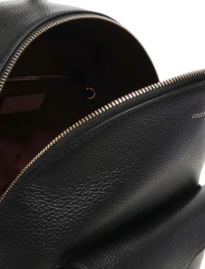 Coccinelle Minimalist Zip-closure Backpack With External Pocket In Black