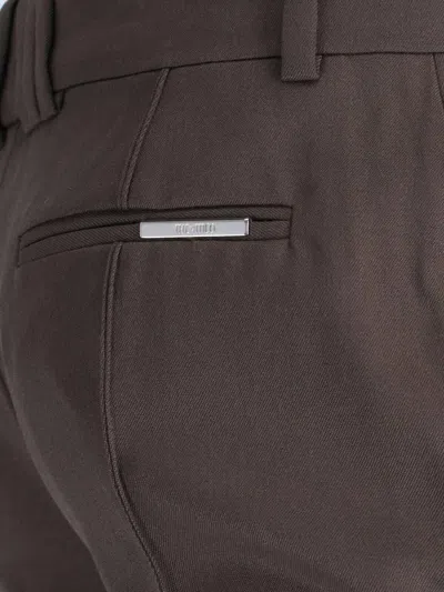 Attico Virgin Wool Bootcut Pants In Brown