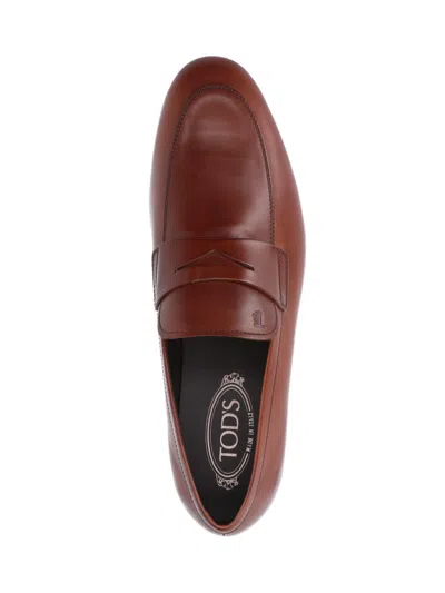 Tod's Pointed Toe Slip-on Shoes With Cut-out Detail In Brown