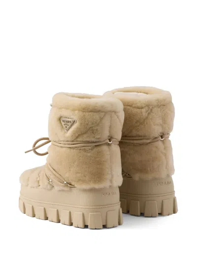 Prada Après-ski-stiefeletten Aus Lammfell In Neutral