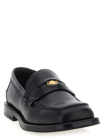 Moschino Strap Penny Round Toe Loafers In Black